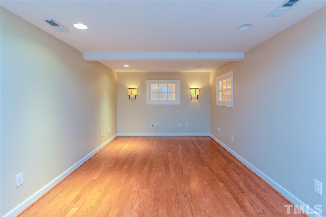 2261 Dunlin Lane Raleigh, NC 27614 - Photo 10 of 25 wooden floor in an empty room with a window
