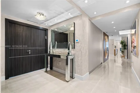 a spacious bathroom with a tub shower sink and mirror