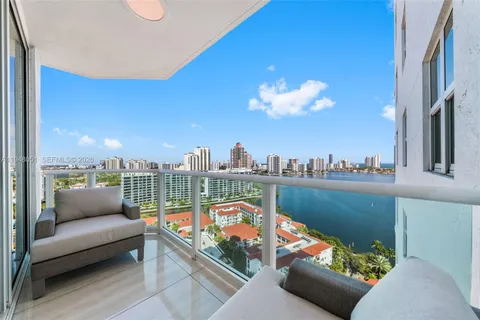 a bathroom with a toilet sink and shower