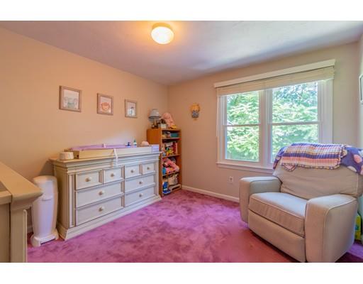 833 Edgell Road Framingham, MA 01701 - Photo 16 of 24 a living room with furniture and a window