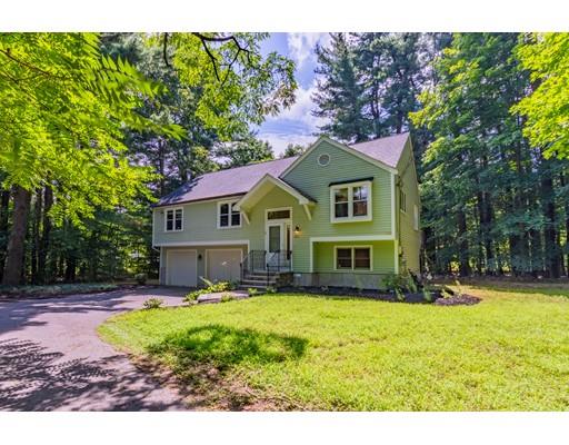 833 Edgell Road Framingham, MA 01701 - Photo 3 of 24 a view of a house with a yard