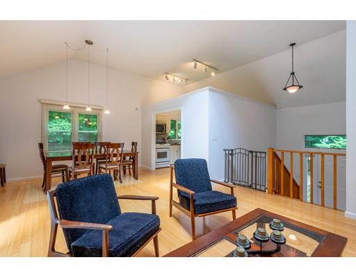 833 Edgell Road Framingham, MA 01701 - Photo 6 of 24 a living room with furniture and a wooden floor