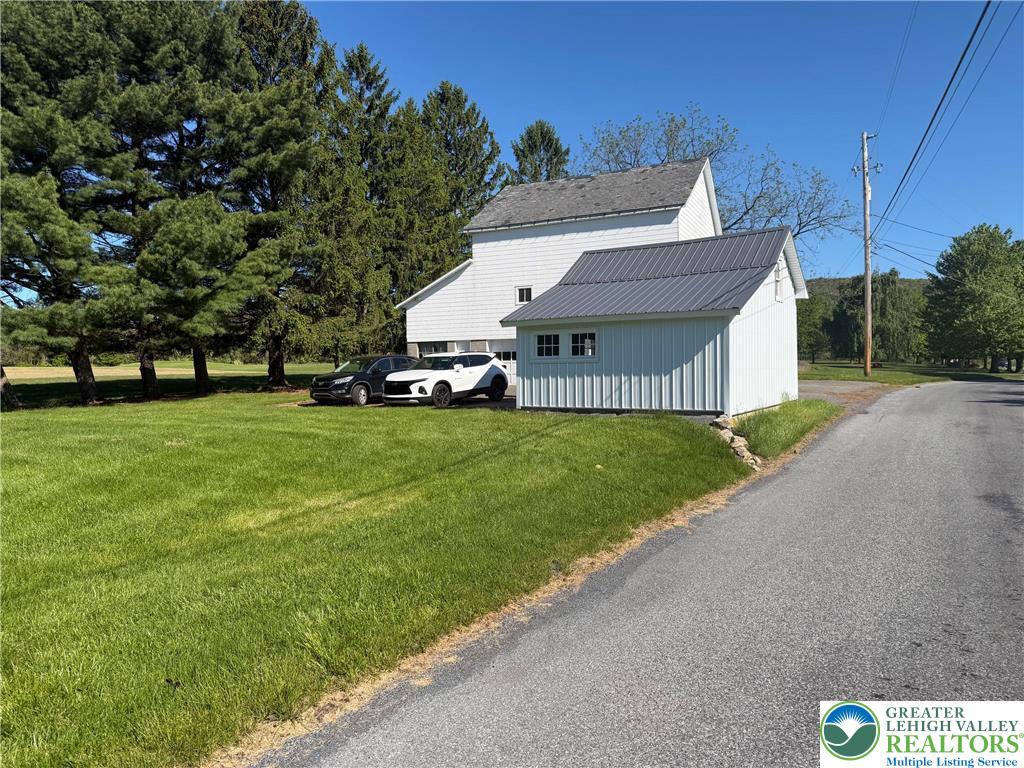 1089 Deemer Road Bath, PA 18014 - Photo 43 of 57 a view of a house with a big yard and large tree