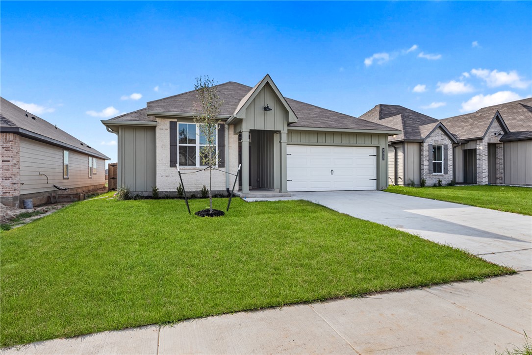2415 Rooke Road Bryan, TX 77807 - Photo 3 of 36 a view of a house with a yard