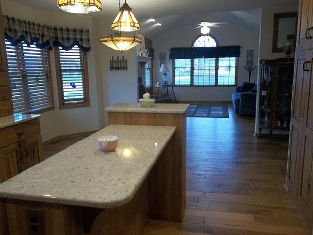 1232 Pickwick Drive Rochelle, IL 61068 - Photo 11 of 16 a kitchen view with wooden floor and chandelier
