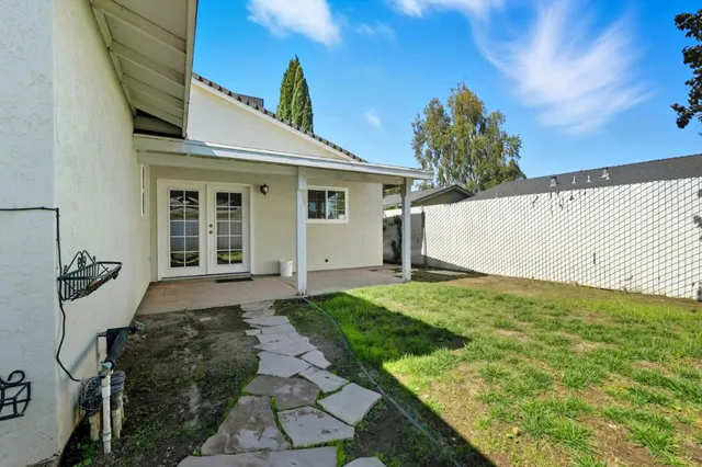 a view of a backyard of the house