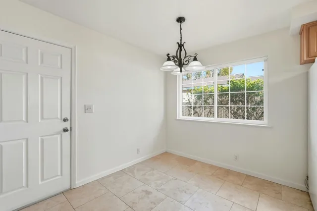 a view of a room with windows