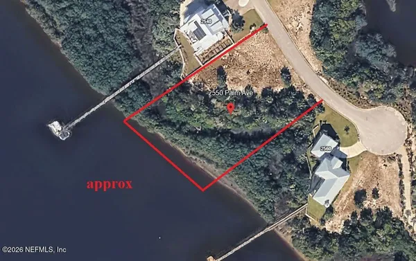 a view of a road with a building in the background