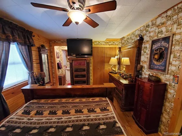 a kitchen with stainless steel appliances granite countertop a refrigerator stove and a sink