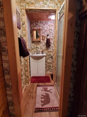 a bathroom with a toilet and a sink