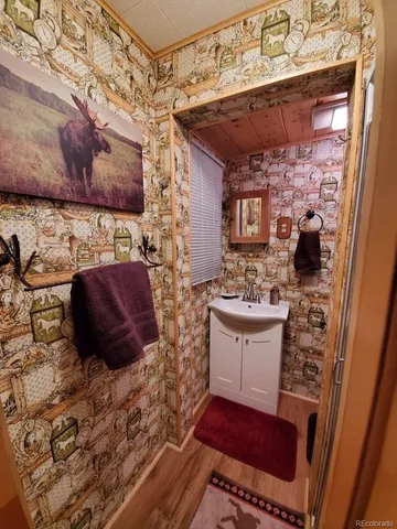 a view of sitting area in front of house