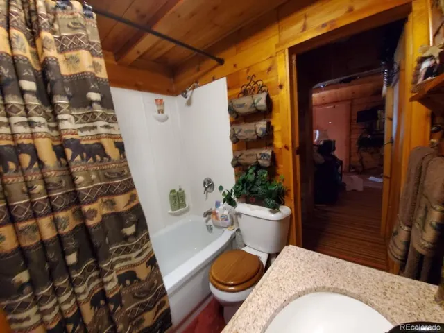 a store room with lots of fruit and vegetables