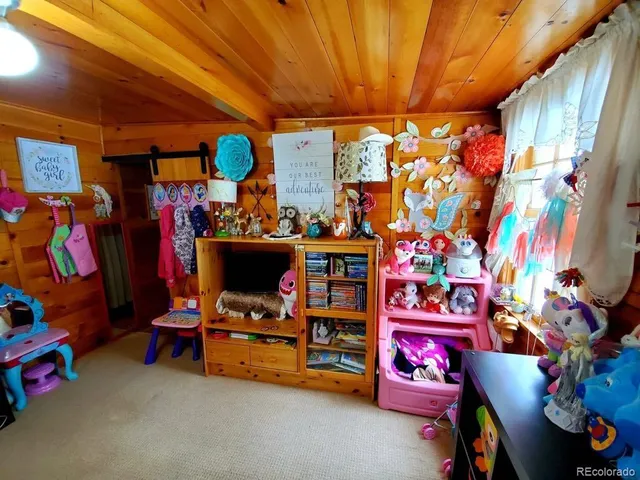 a bathroom with a sink a mirror and shower