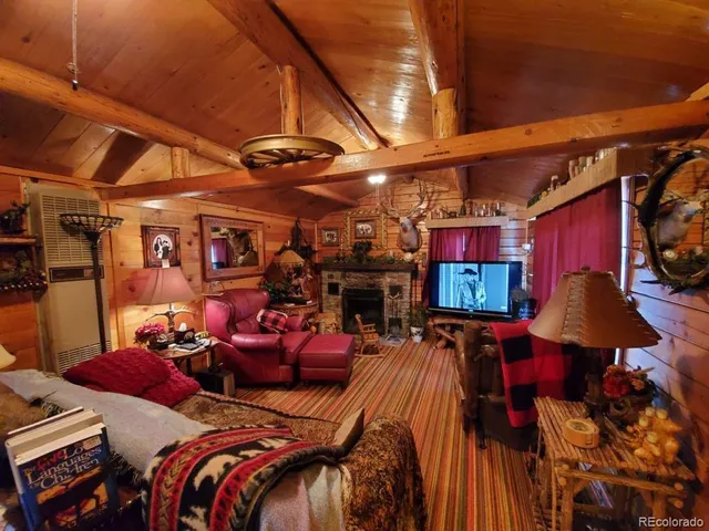 a view of a room with lots of furniture