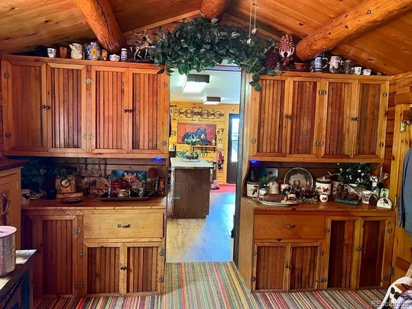 a view of living room with furniture and window