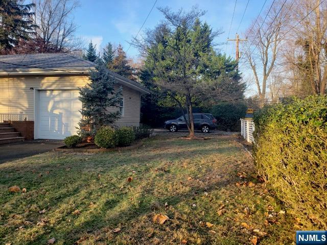 99 Knickerbocker Road Demarest, NJ 07627 - Photo 2 of 10 a view of backyard with tree
