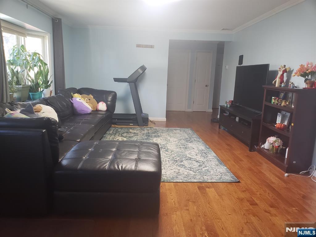 99 Knickerbocker Road Demarest, NJ 07627 - Photo 6 of 10 a living room with furniture and a flat screen tv
