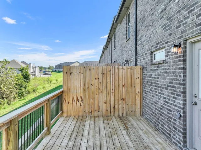 an aerial view of a city with lawn chairs
