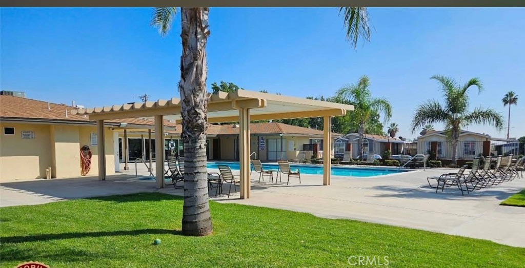 250 North Linden Avenue, Unit 148 Rialto, CA 92376 - Photo 13 of 17 a front view of building with yard