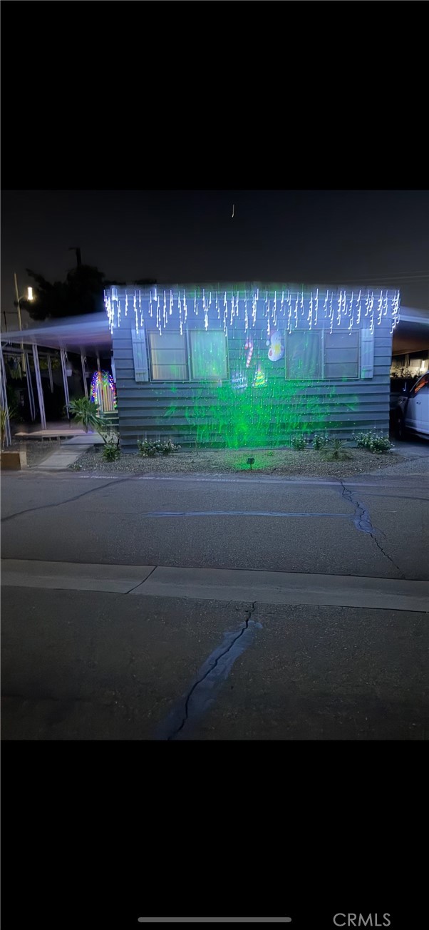 250 North Linden Avenue, Unit 148 Rialto, CA 92376 - Photo 17 of 17 a dinning table and chairs in patio