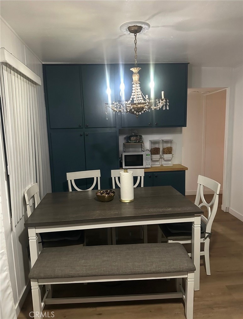 250 North Linden Avenue, Unit 148 Rialto, CA 92376 - Photo 2 of 17 a view of a dining room with furniture