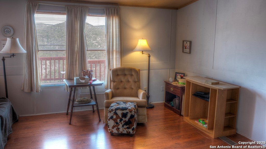 560 Pine Mountain Road Camp Wood, TX 78833 - Photo 14 of 38 a bedroom with furniture and a window