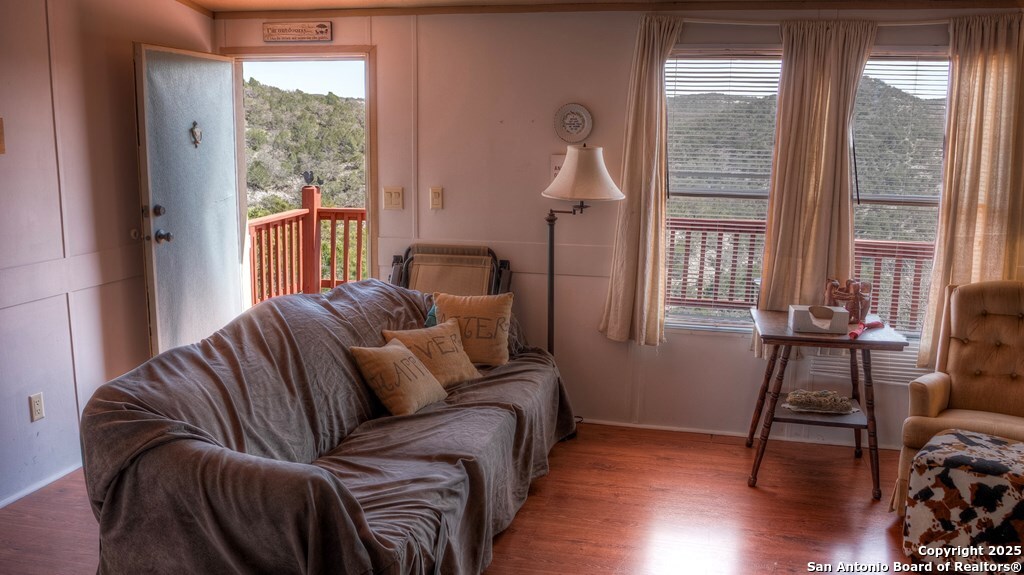 560 Pine Mountain Road Camp Wood, TX 78833 - Photo 15 of 38 a living room with furniture and a window