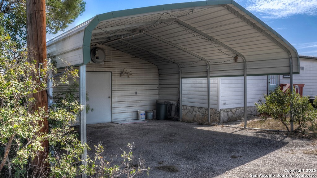 560 Pine Mountain Road Camp Wood, TX 78833 - Photo 8 of 38 a view of a house with a yard