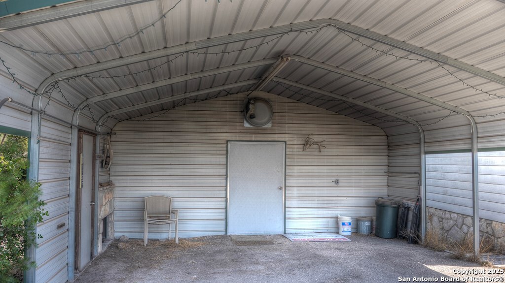 560 Pine Mountain Road Camp Wood, TX 78833 - Photo 9 of 38 a view of a door and an outdoor space