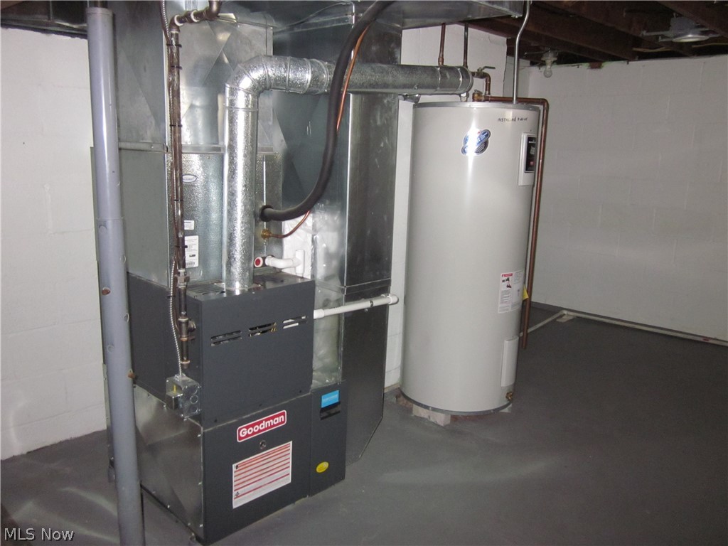 30321 Georgetown Road Salem, OH 44460 - Photo 27 of 38 Furnace and hot water tank