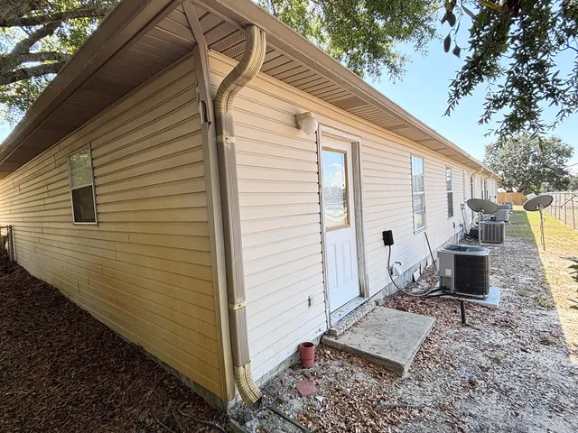a view of backyard of house
