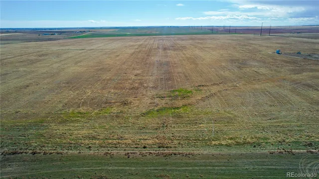 a view of floor to ceiling window and wooden floor