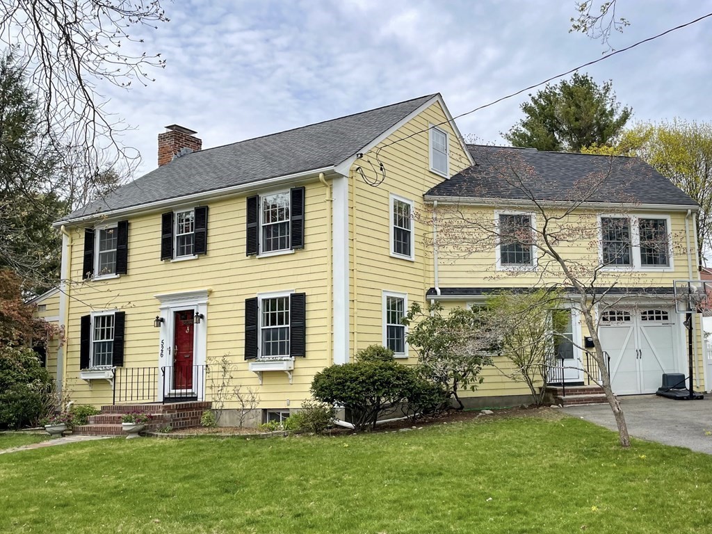 526 Quinobequin Road Newton, MA 02468 - Photo 1 of 42 a front view of a house with a yard