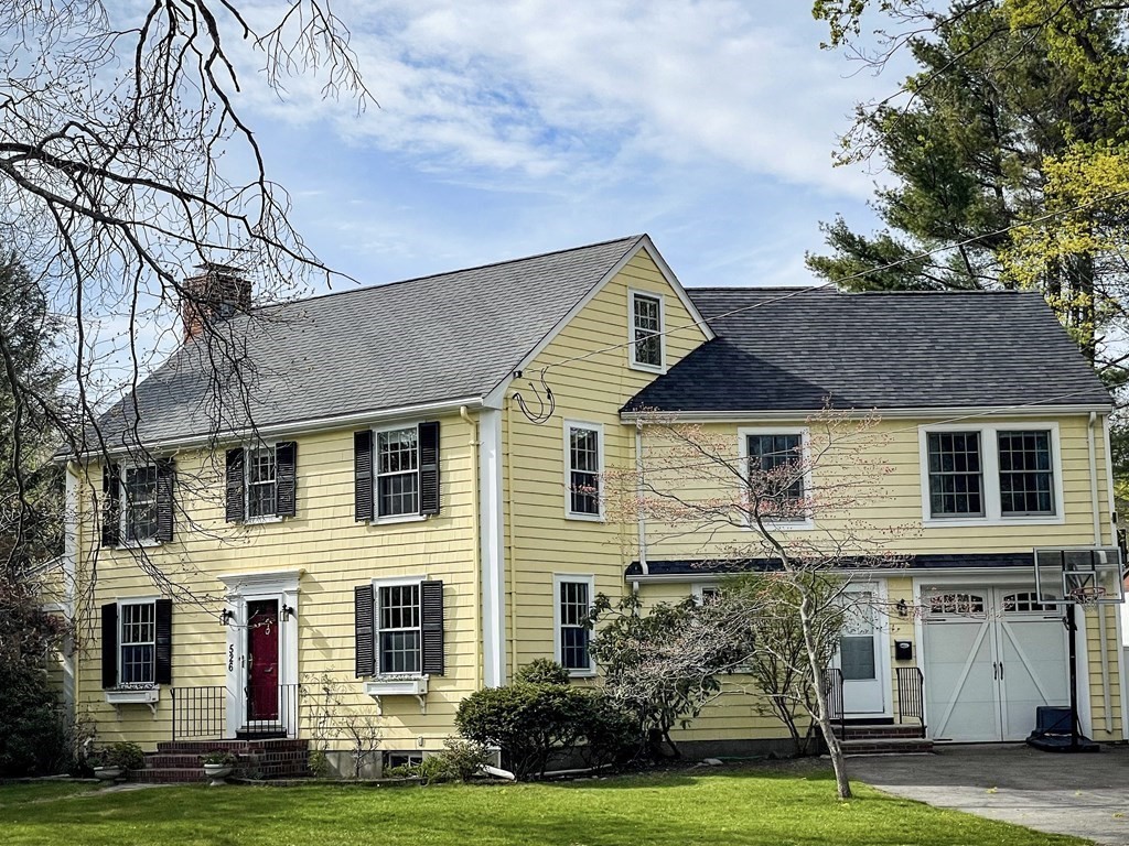 526 Quinobequin Road Newton, MA 02468 - Photo 2 of 42 a front view of a house with a yard