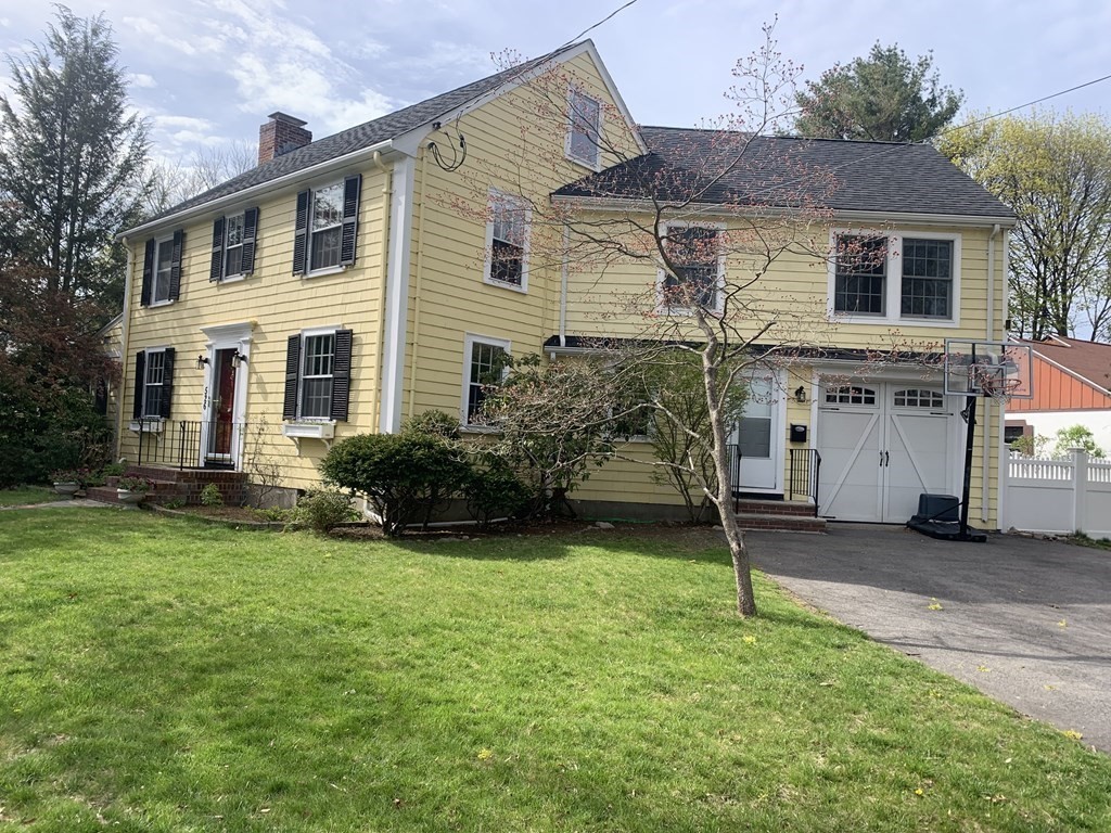 526 Quinobequin Road Newton, MA 02468 - Photo 3 of 42 a view of a yard in front of a house