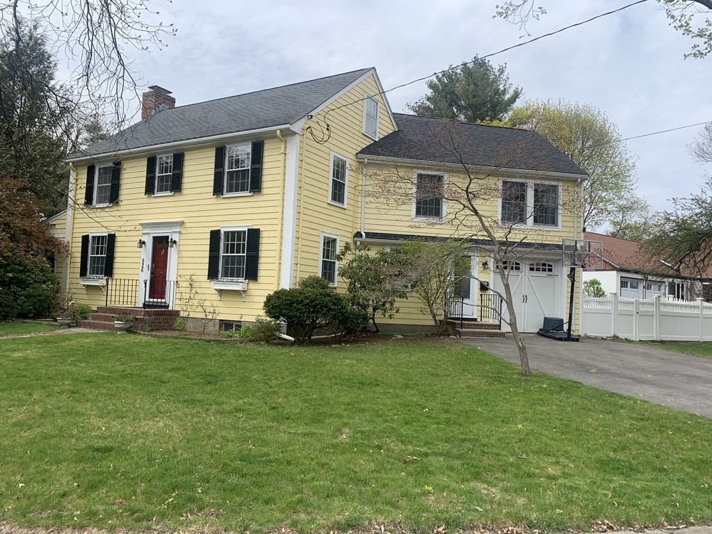 526 Quinobequin Road Newton, MA 02468 - Photo 4 of 42 a view of a yard in front of a house