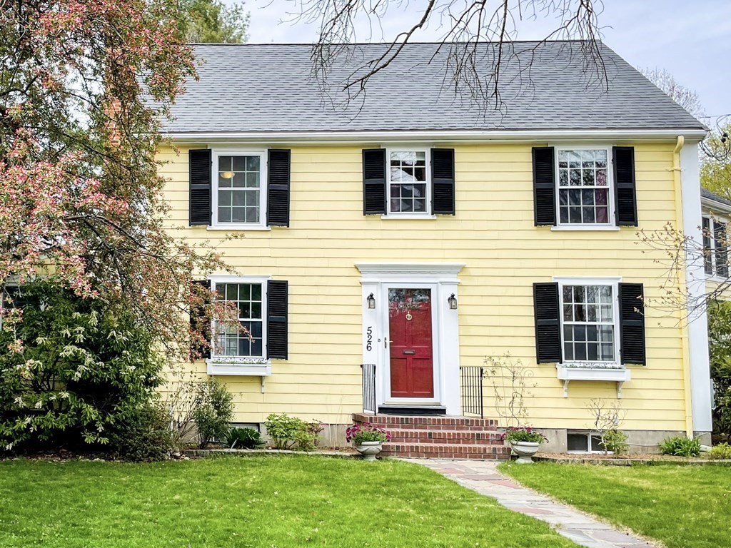 526 Quinobequin Road Newton, MA 02468 - Photo 5 of 42 a front view of a house with a yard