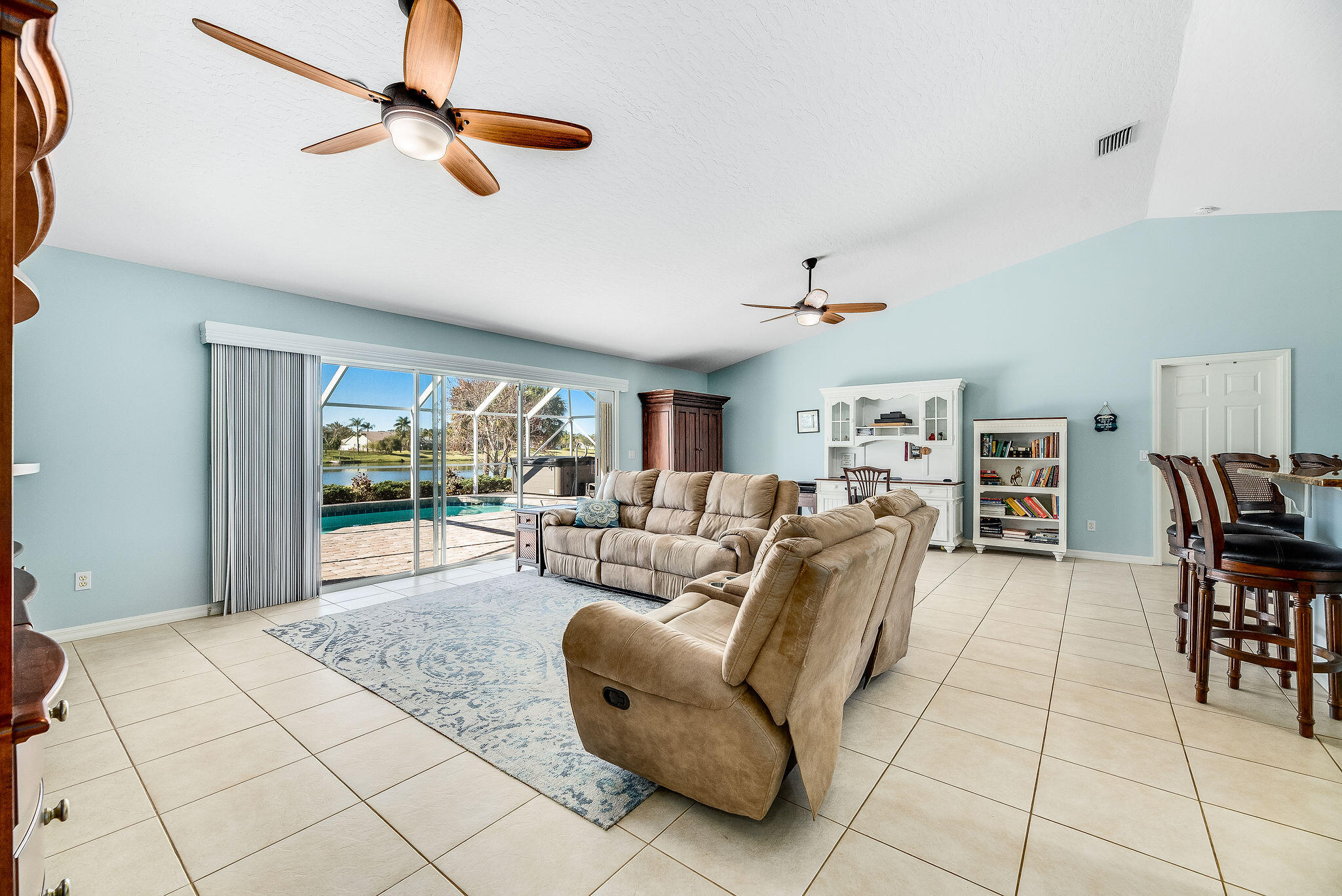 1566 Eagles Circle Sebastian, FL 32958 - Photo 34 of 74 a living room with furniture and a window