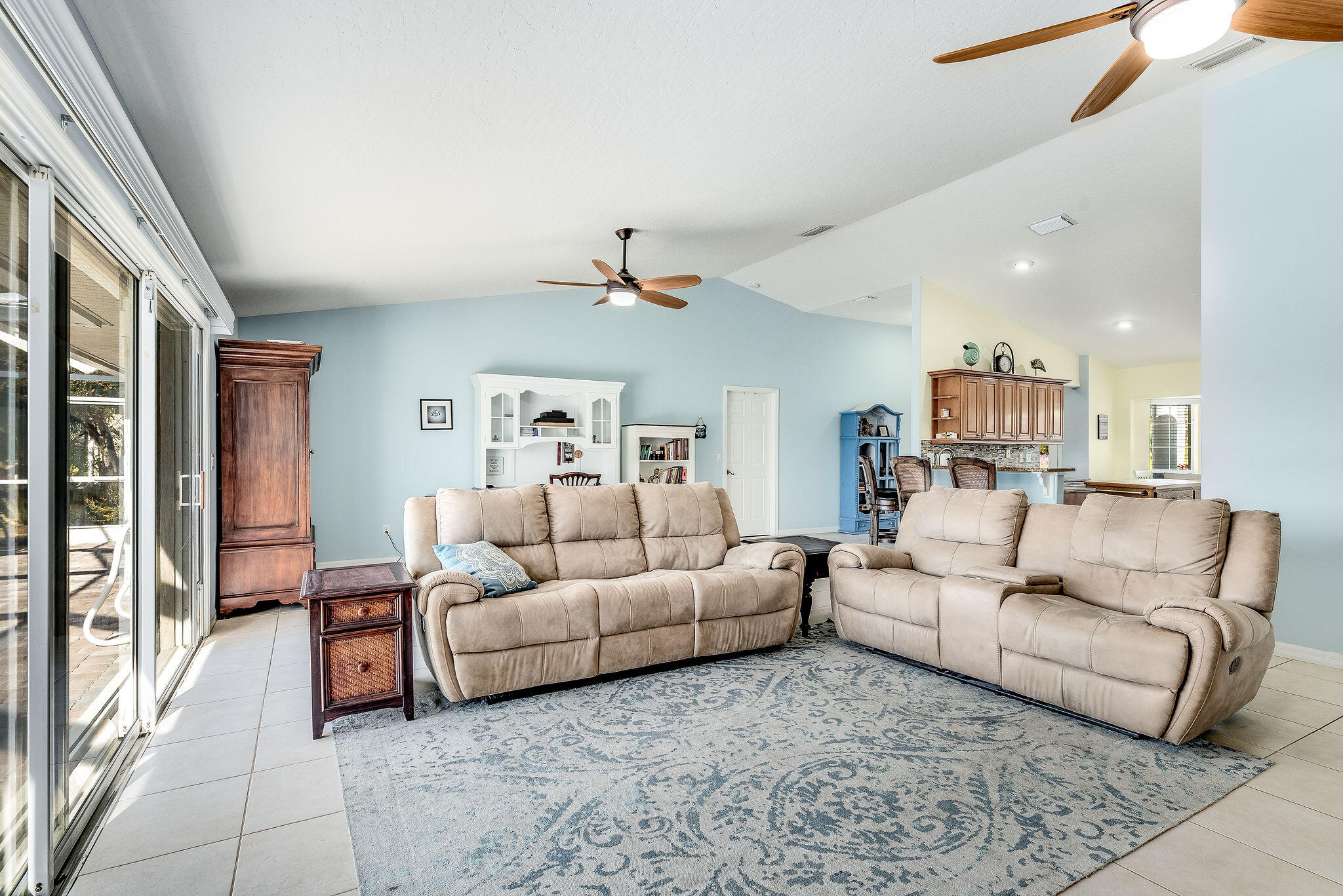 1566 Eagles Circle Sebastian, FL 32958 - Photo 35 of 74 a living room with furniture and a chandelier