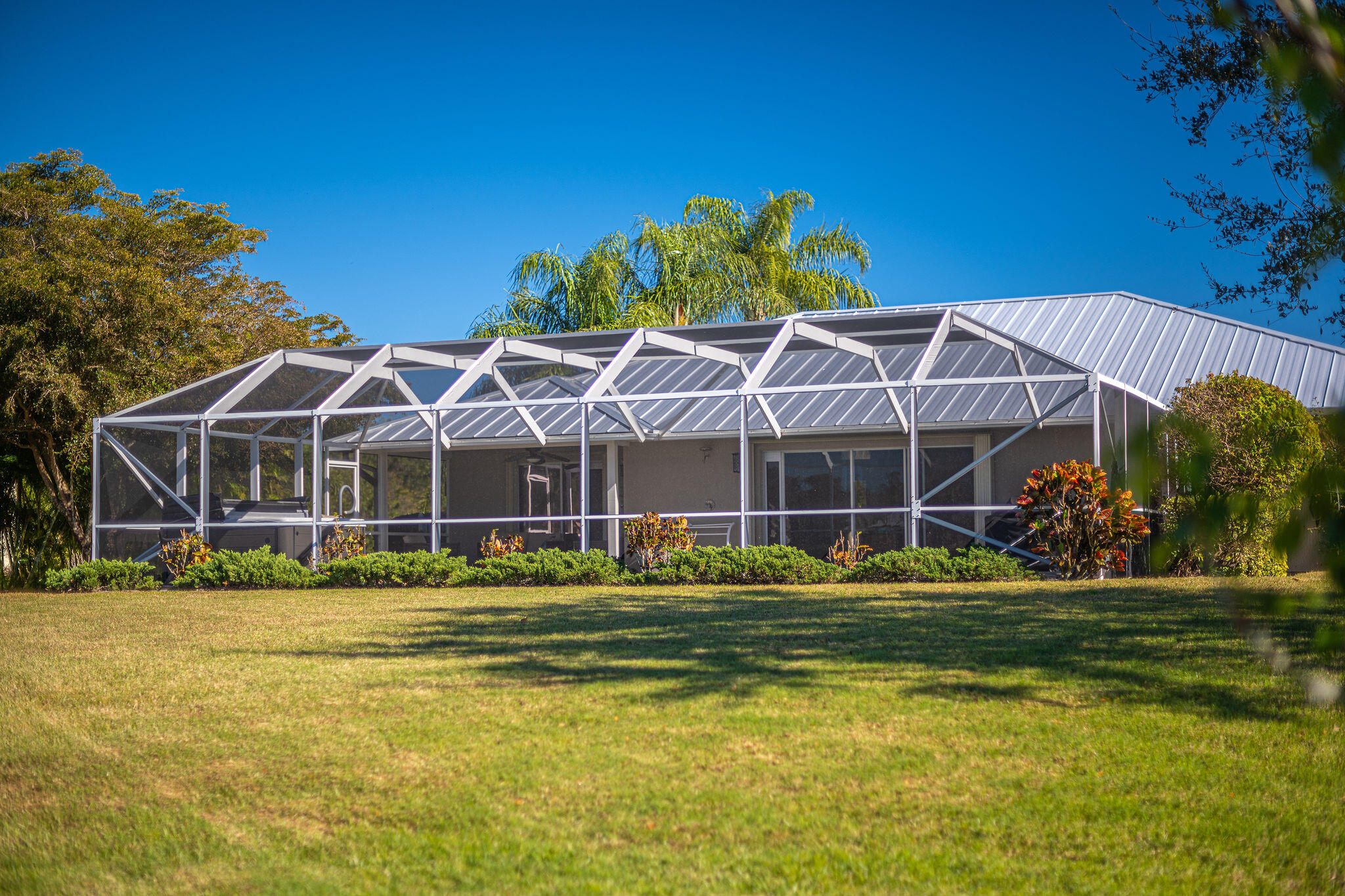 1566 Eagles Circle Sebastian, FL 32958 - Photo 47 of 74 a view of a house with a yard and sitting area