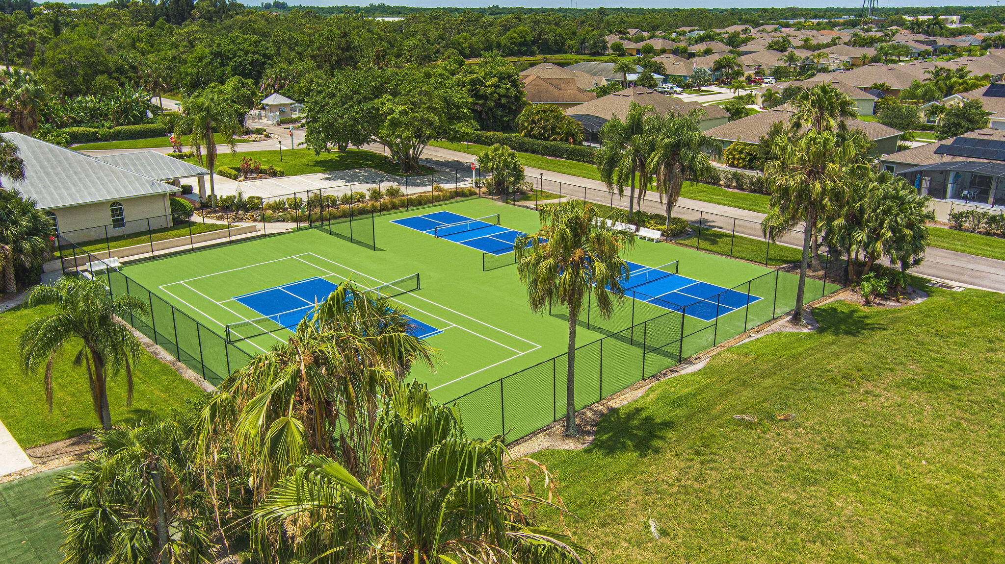 1566 Eagles Circle Sebastian, FL 32958 - Photo 67 of 74 an aerial view of a tennis ground