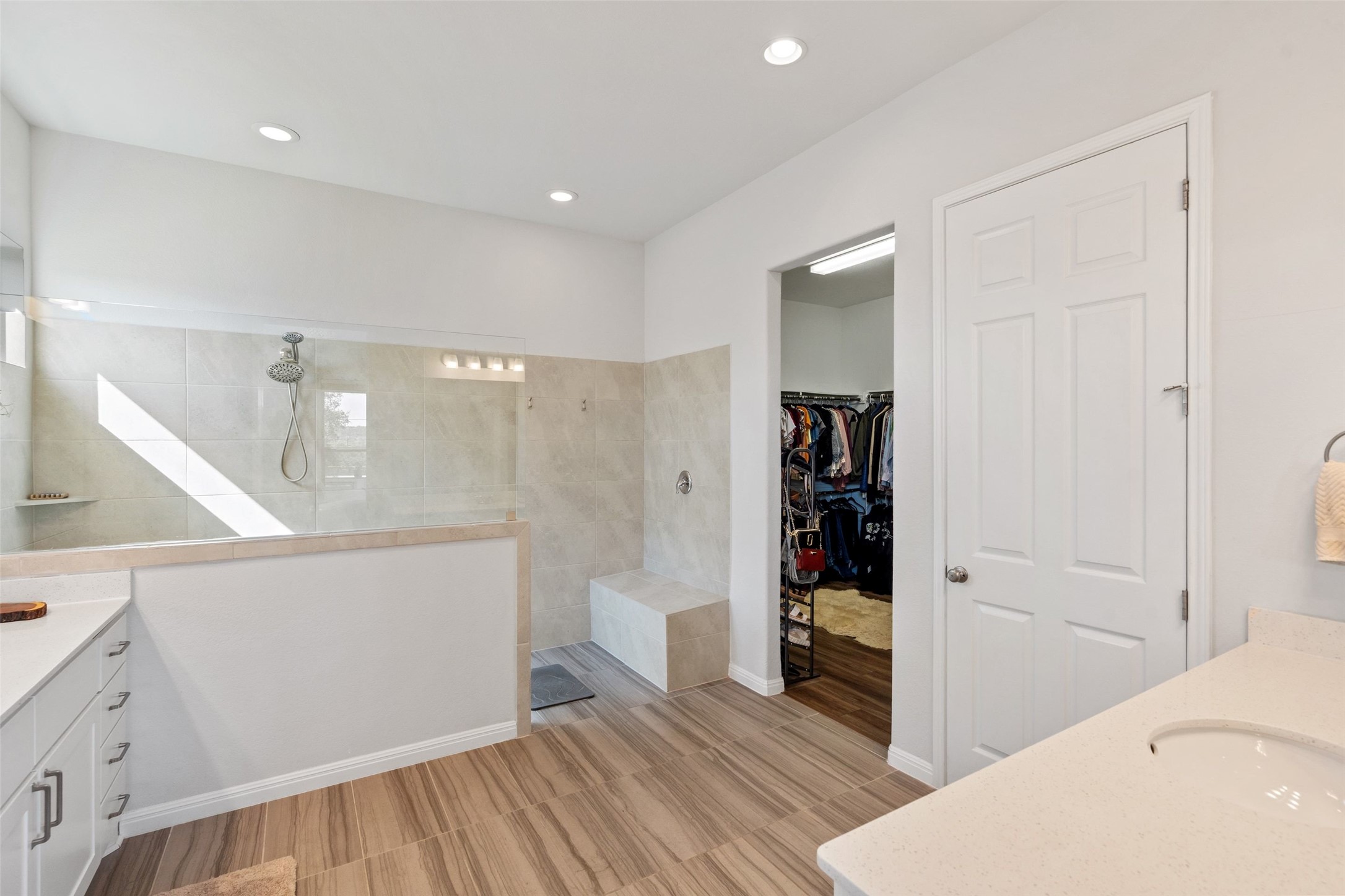 162 Lunar Loop Austin, TX 78737 - Photo 17 of 40 a hallway with wooden floor and staircase