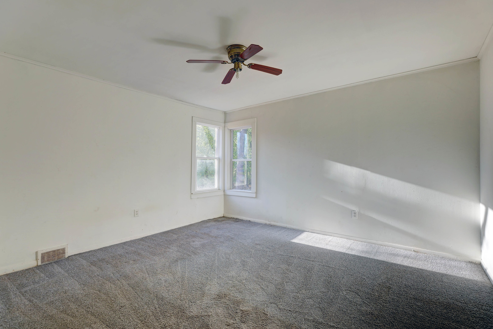 1025 North Rand Road Prospect Heights, IL 60070 - Photo 8 of 16 a view of an empty room with a window