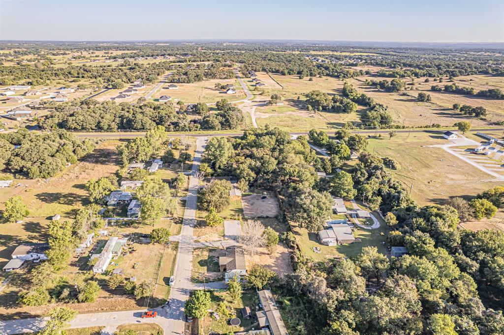 123 Kelly Azle, TX 76020 - Photo 8 of 28 an aerial view of residential building with parking space