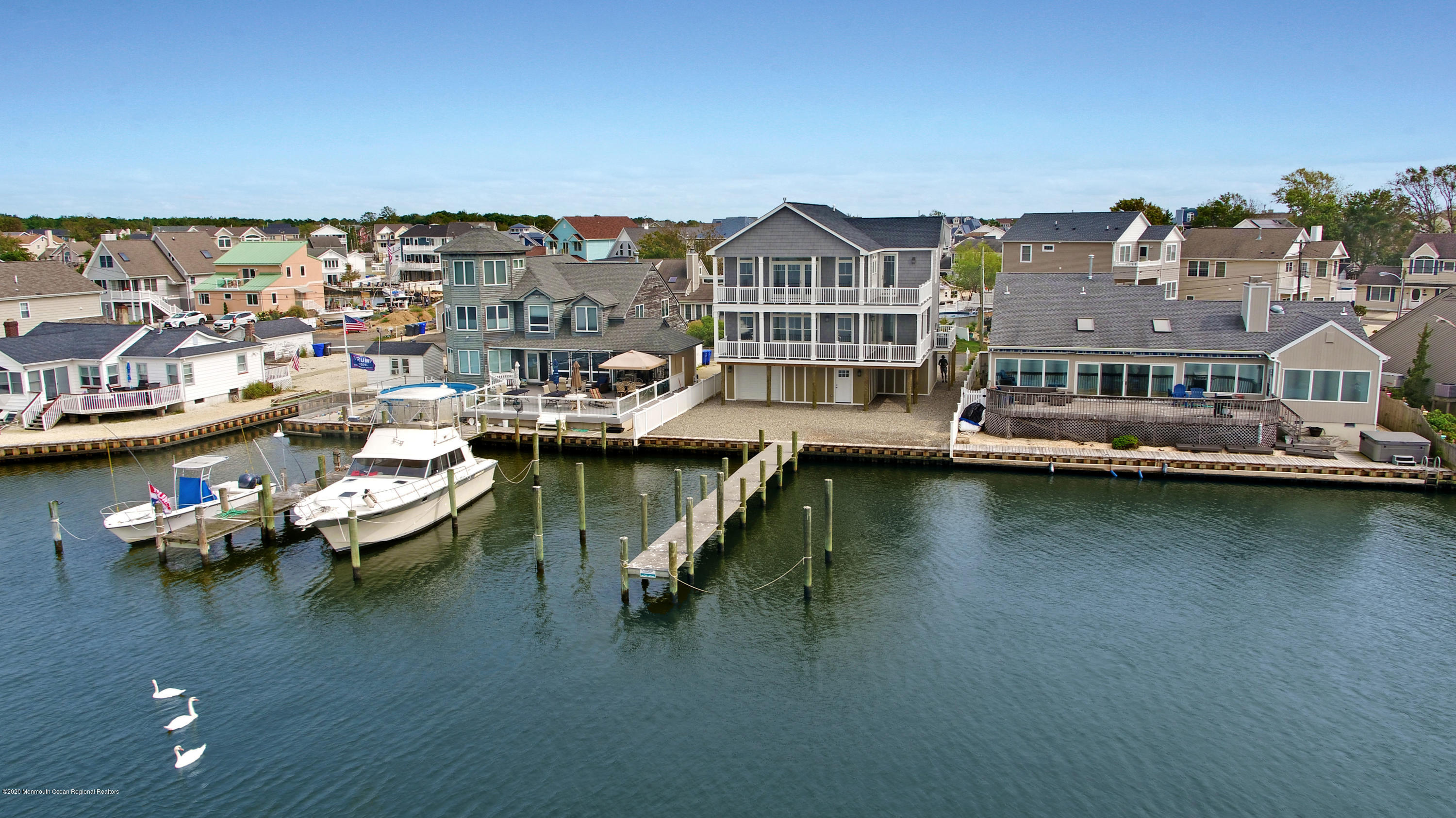 125 Shore Drive Brick, NJ 08723 - Photo 2 of 83 an aerial view of a house with a ocean view