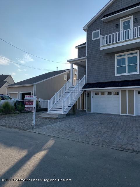 125 Shore Drive Brick, NJ 08723 - Photo 17 of 83 a view of a house with a garage