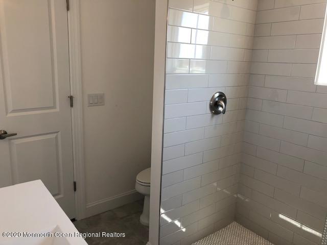 125 Shore Drive Brick, NJ 08723 - Photo 29 of 83 a bathroom with a shower