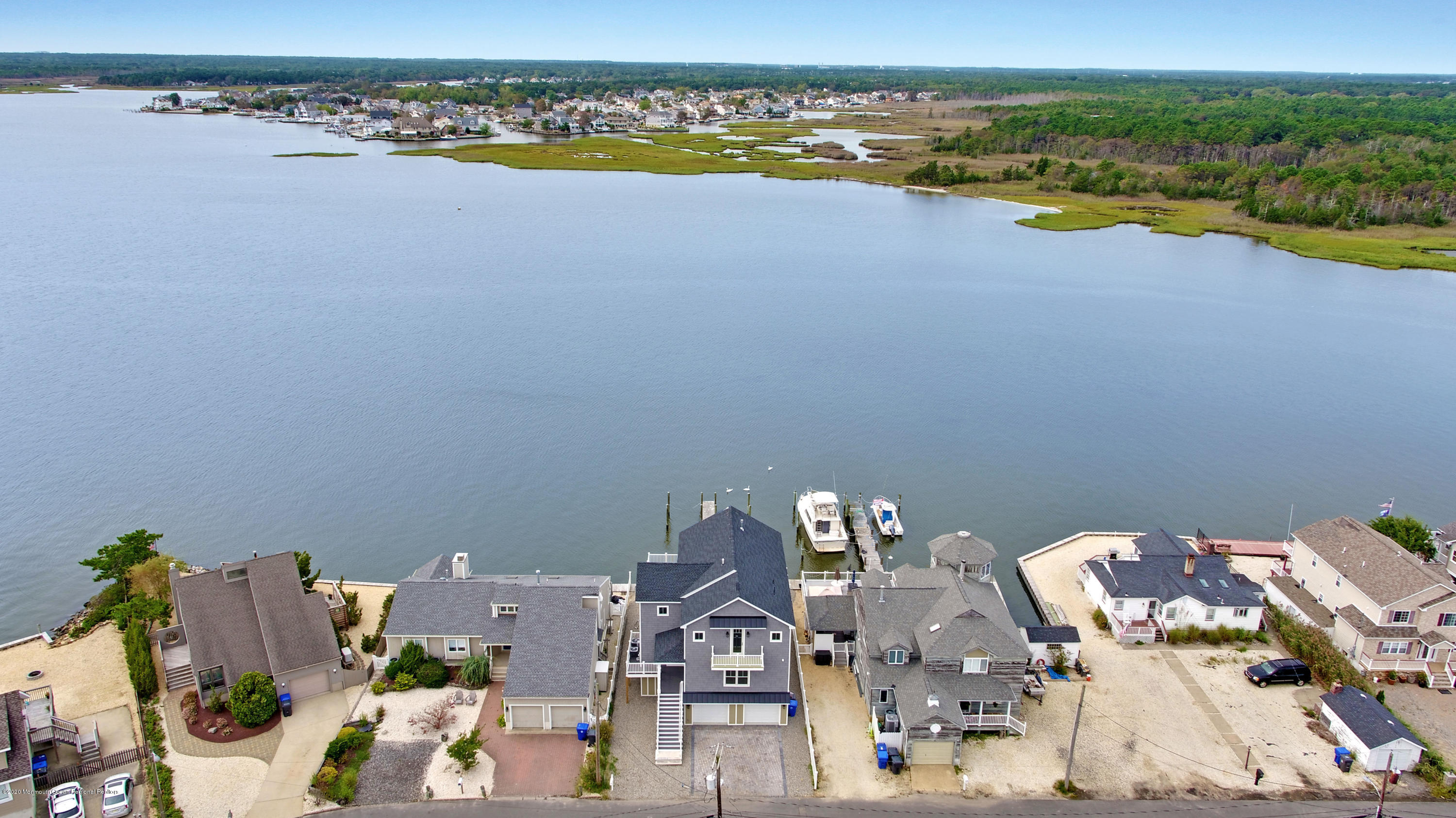 125 Shore Drive Brick, NJ 08723 - Photo 4 of 83 an aerial view of a house with a lake view