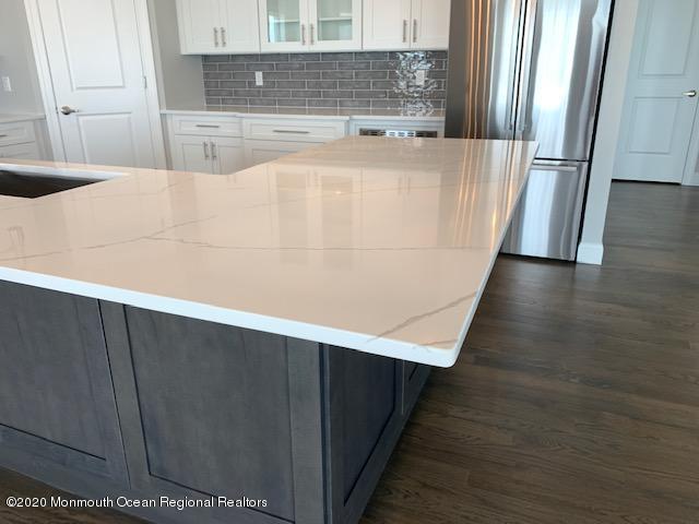 125 Shore Drive Brick, NJ 08723 - Photo 41 of 83 a view of a kitchen with wooden floor