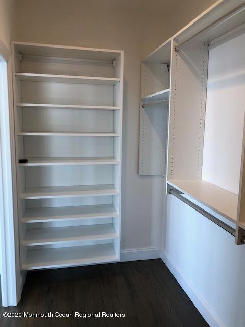 125 Shore Drive Brick, NJ 08723 - Photo 54 of 83 a view of walk in closet with empty racks